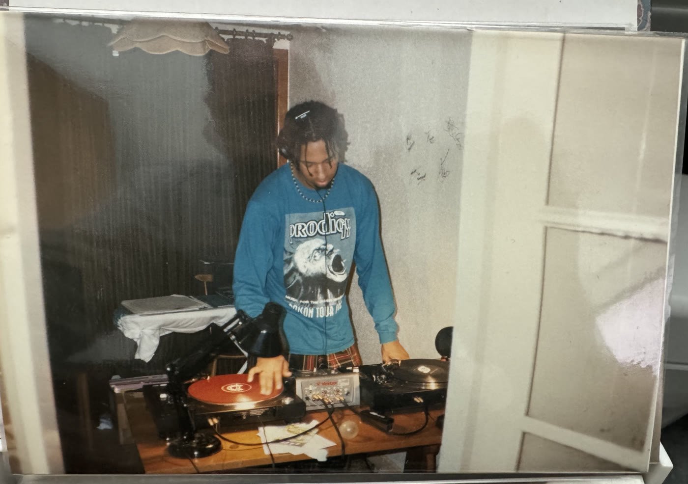 Matt Cox DJing with vinyl records in 1997